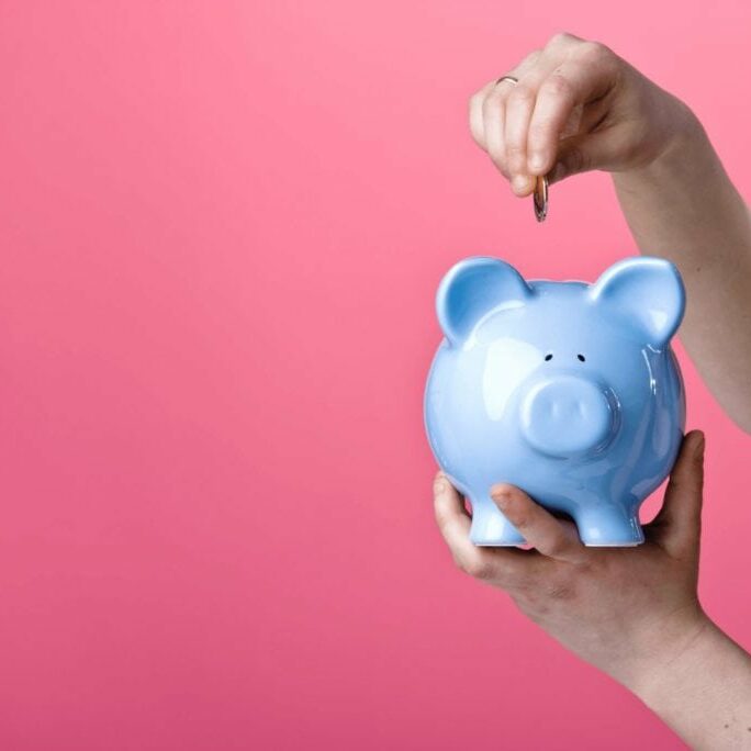 Retirement income planning - blue piggy bank saving